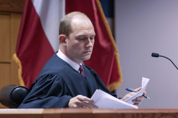 The judge in Trump's Georgia election case limits the disclosure of evidence after videos' release