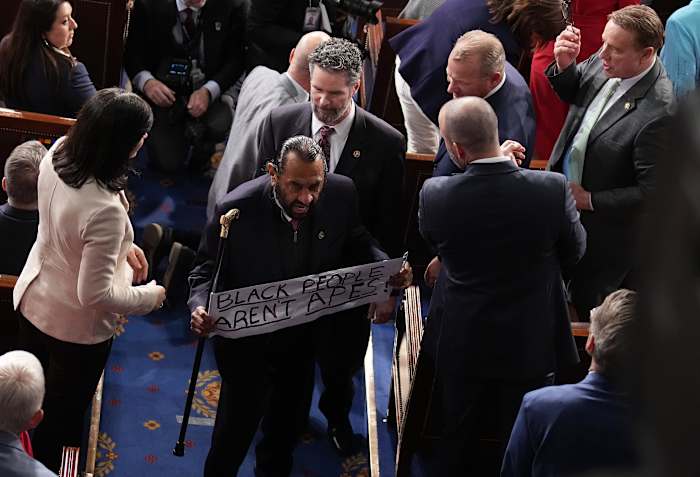 Texas Rep. Al Green escorted out of House chamber after waving sign during Trump’s State of the Union