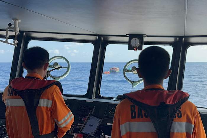 Rescuers try to find 27 people believed to be on raft drifting in Indonesian waters