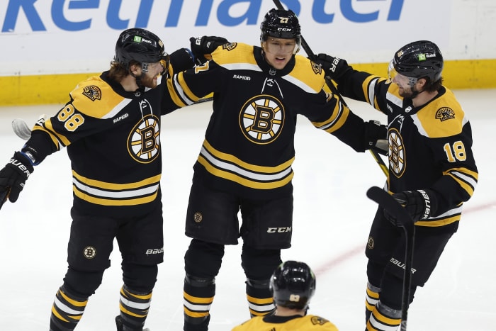 NHL-best Bruins clinch Atlantic with 2-1 win over Tampa Bay - The
