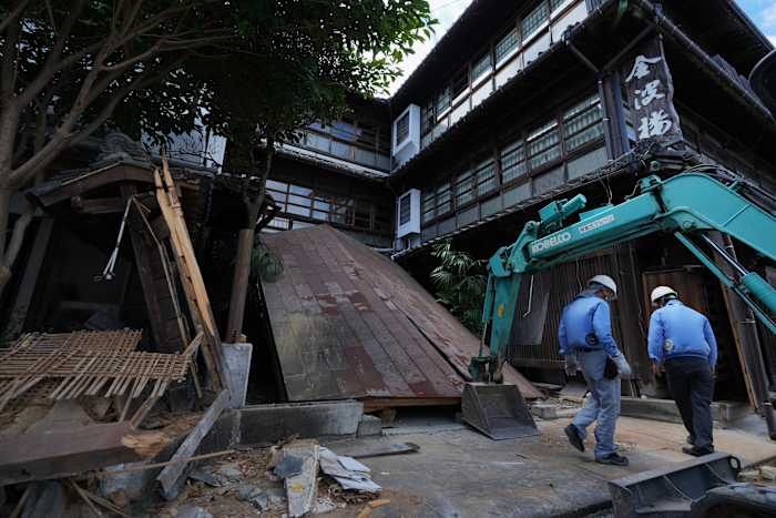 Image linked from the original feed: A woman with apparent heat stroke found dead while taking shelter in a car in quake-hit Japan