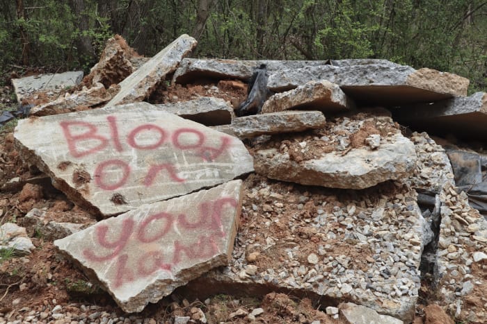 Muddy clothes? 'Cop City' activists question police evidence