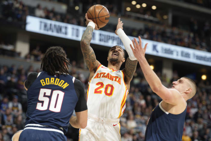 Young, Hawks open season with 113-87 rout of Mavericks