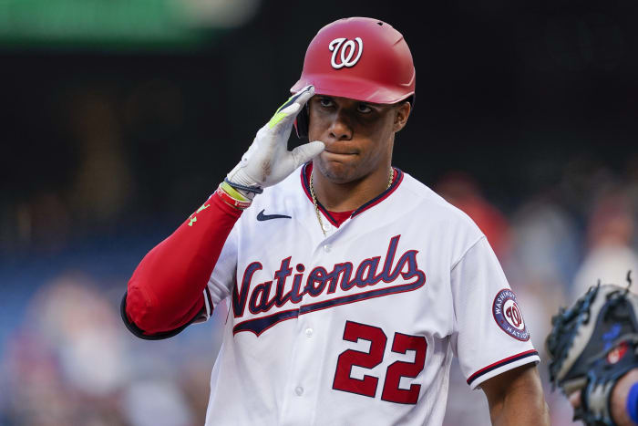 Baseball Hall of Famer Vladimir Guerrero, left, talks with Washington  Nationals manager Dave Martinez, right, before a baseball game against the  Kansas City Royals, Saturday, July 6, 2019, in Washington. The Nationals