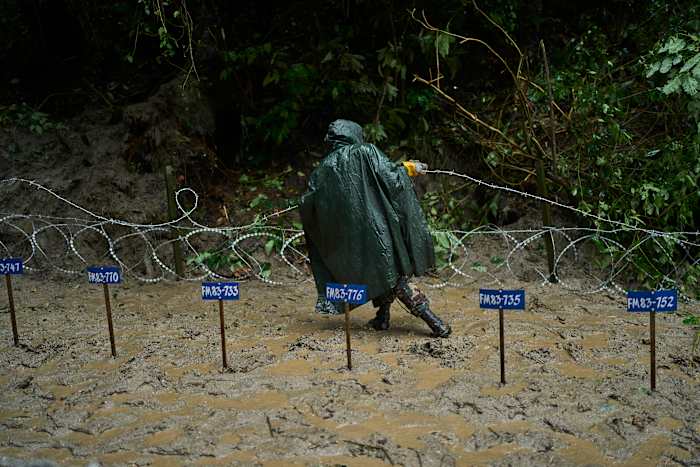 Mass burials in Nepal as death toll from flash floods exceeds 1,000