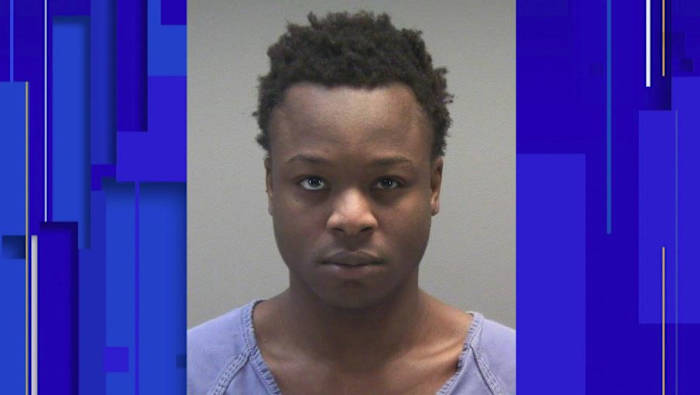 25-year-old arrested after man found dead in crashed car in Orlando