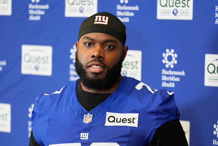 Giants restructure left tackle Andrew Thomas' contract to clear cap space, AP source says