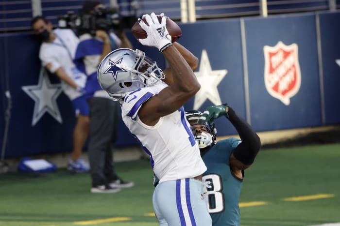 Tom Brady attempts low slide tackle of Cowboys' Malik Hooker during fumble  return