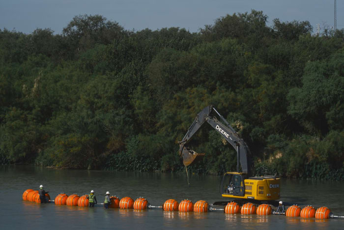 U.S. sues Texas after Gov. Greg Abbott declines to remove floating border barrier