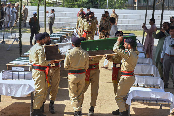 A mass funeral is held for 22 Pakistani soldiers w