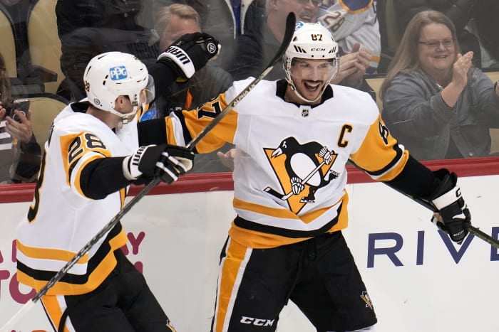 Evgeni Malkin scores 400th goal, Penguins beat Flames 4-1