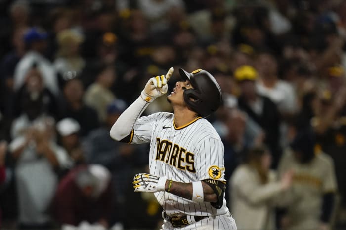 Manny Machado hits 31st homer, Padres beat Rockies, 13-6