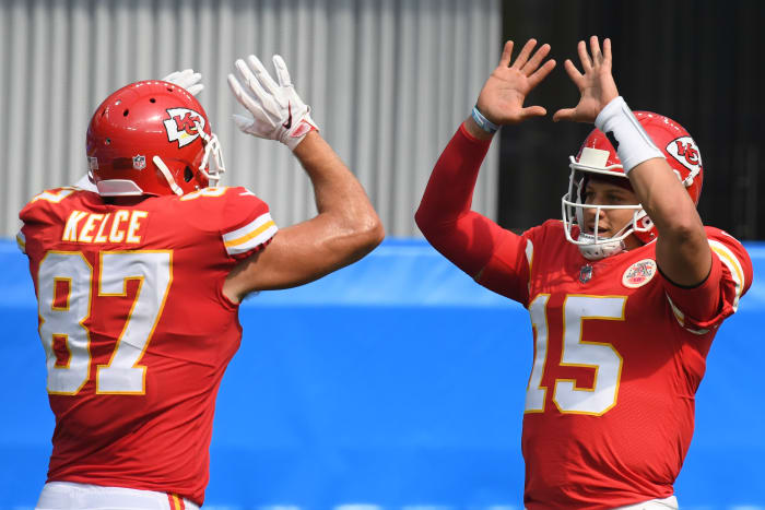 Photo shows Kansas City Chiefs players Patrick Mahomes, Travis