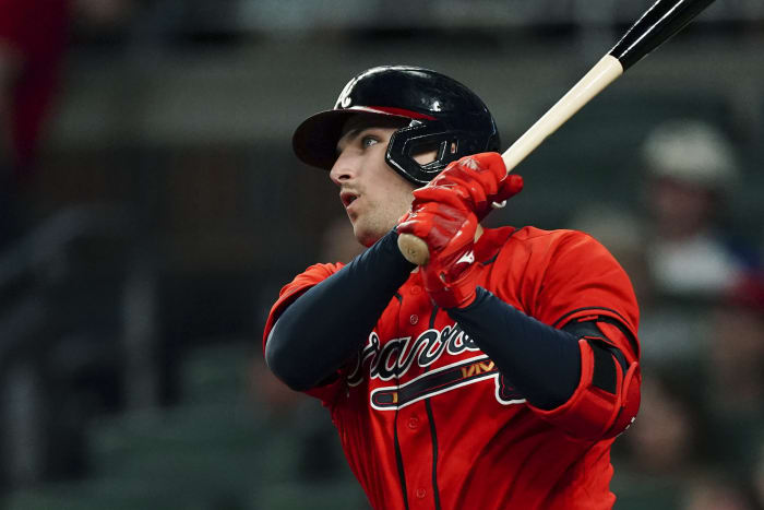 Cardinals score 4 in 9th, beat Nationals 9-7, reach NLCS