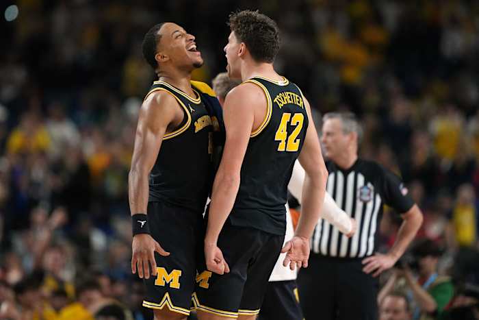 Michigan rolls to national title game with its latest double-digit March win, 91-73 over Arizona