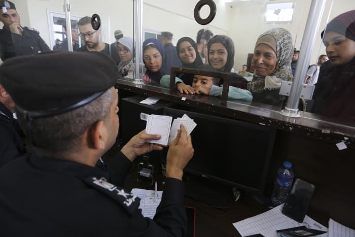 As more Palestinians with foreign citizenship leave Gaza, some families are left in the lurch
