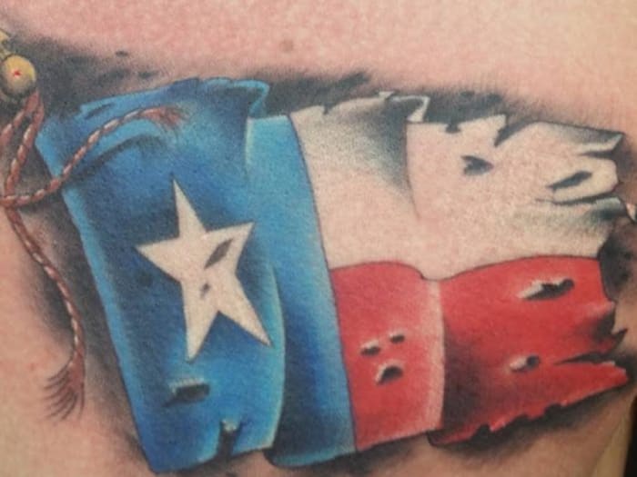 Duck In Texas Map Tattoo On Man Chest