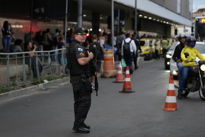 Rio police release 17 hostages from a gunman on a bus, at least 2 wounded