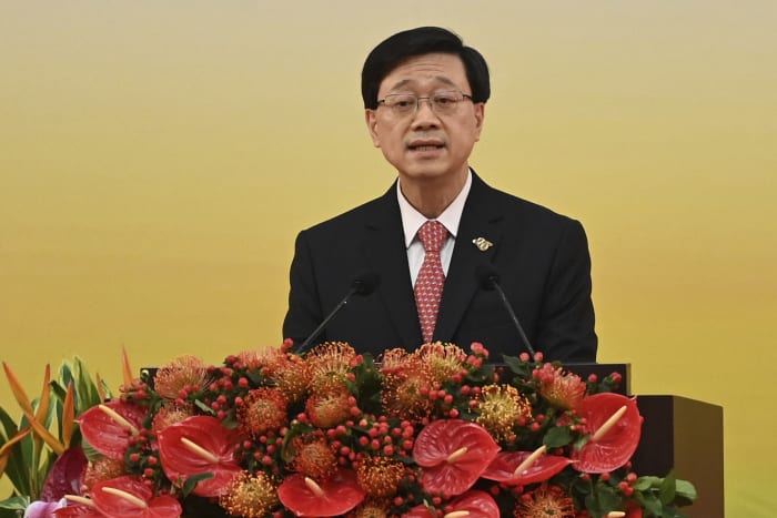 Hong Kong's leader may be barred from a key economic summit. The city says that breaks conventions