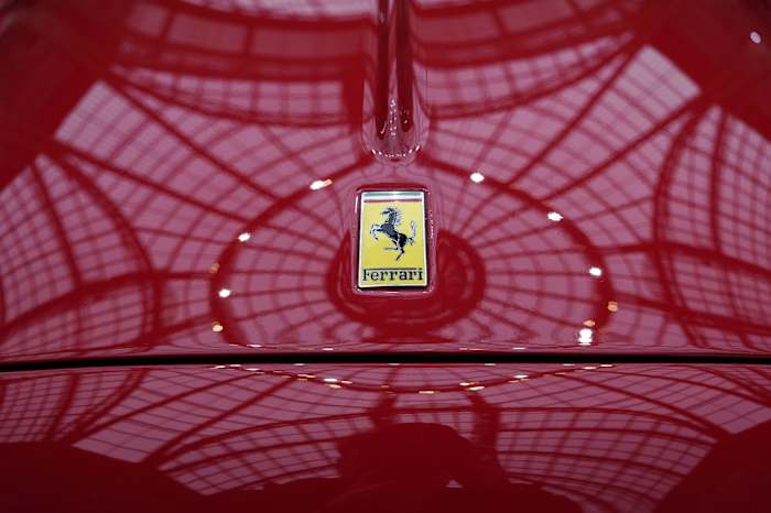 Ferrari reveals features of first fully electric vehicle, but its financial outlook mars the debut