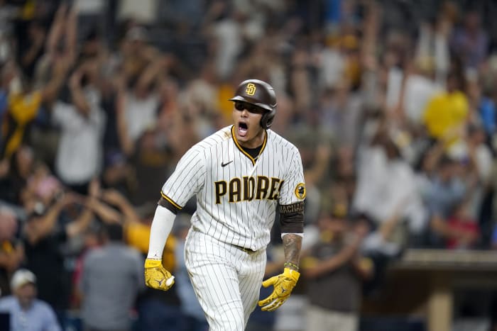 Manny Machado hits 31st homer, Padres beat Rockies, 13-6