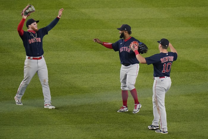 Boston Red Sox players, from left, Christian Vazquez, Xander Bogaerts, Matt  Barnes, Marwin Gonzalez and Rafael Devers celebrate after defeating the New  York Yankees during a baseball game, Friday, June 25, 2021