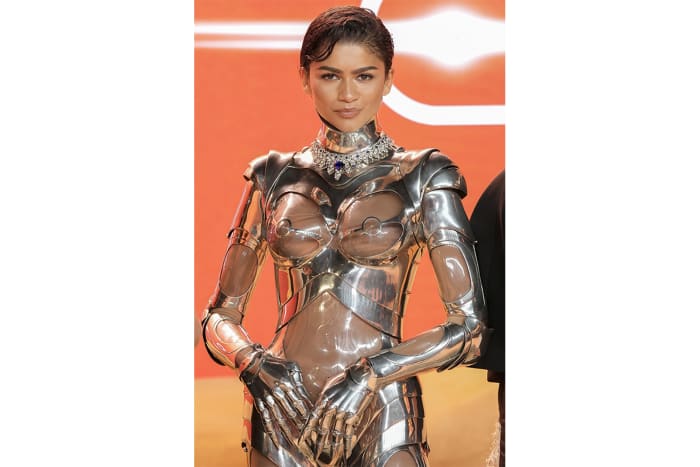 Mugler debuts Part Two in a vintage silver cyborg suit at world premiere
