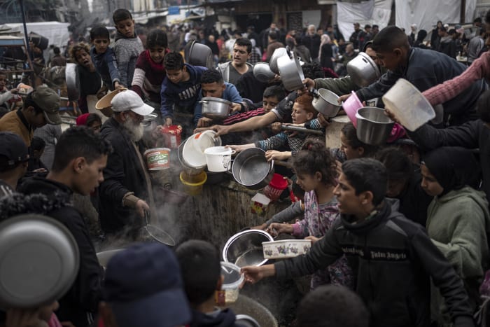 Live updates | As the death toll passes 20,000, the U.N. again delays a vote on aid to Gaza