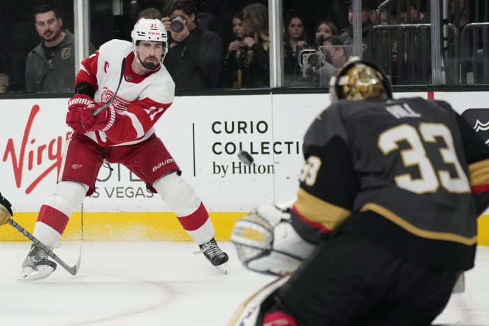 Newly acquired Golden Knights center Jack Eichel helps lead drills