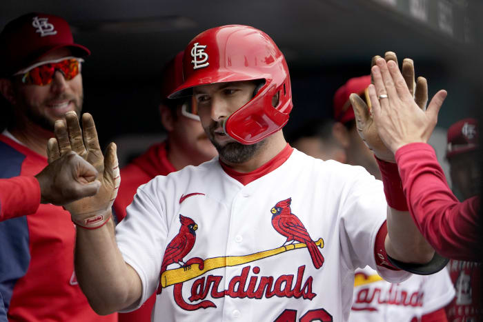 Cards match record with 14th straight win, rip Cubs 12-4