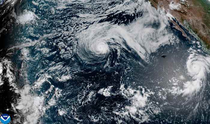 Image linked from the original feed: Hurricane Genevieve roars in the Pacific as Fausto weakens to a tropical storm near Hawaii