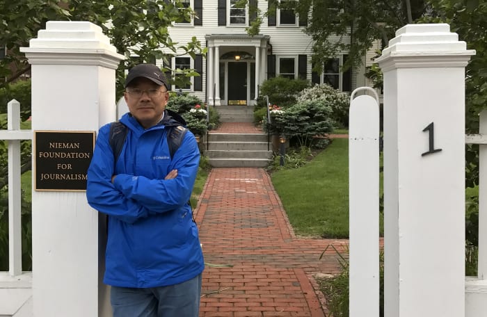 Family: Chinese journalist faces espionage charges