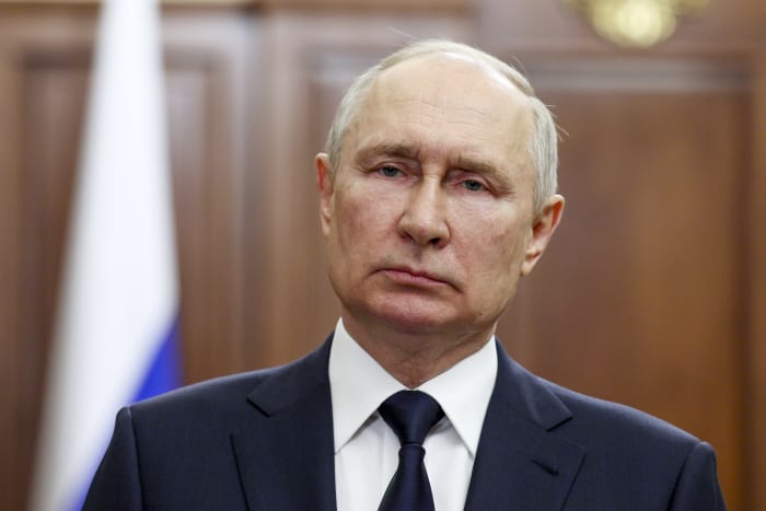 Putin visits a shipyard to oversee the commissioning of new Russian nuclear submarines