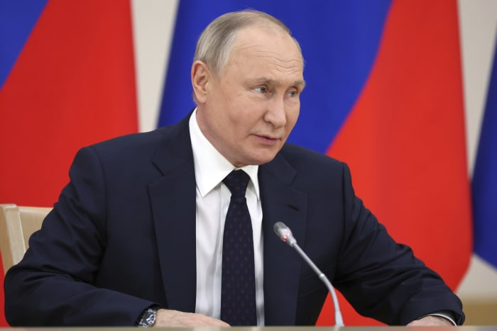 Putin is taking questions from ordinary Russians along with journalists as his reelection bid begins
