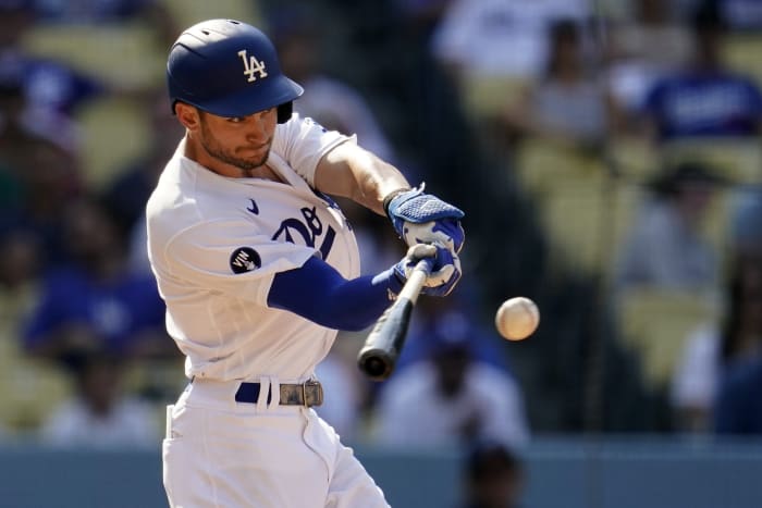 Betts and Muncy, both new dads, power Dodgers past Cards 7-3