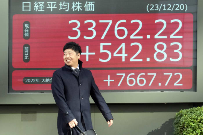 Stock market today: Asian shares gain after Wall Street ticks higher amid rate-cut hopes