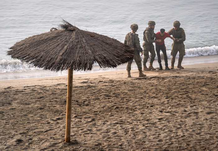Image linked from the original feed: Death toll in Spain-Morocco border crisis in Ceuta reaches 67 as tens of thousands cross back