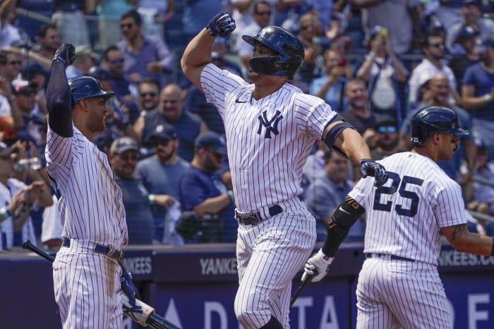Yankees fans pelt Cleveland outfielders with debris after comeback win