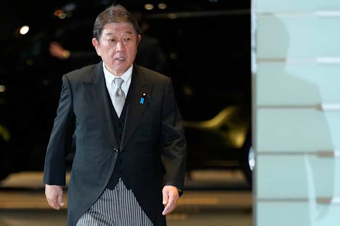 Japan says it plans to tell Trump it will build up military and upgrade security strategy