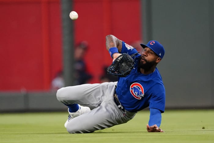 Cody Bellinger drives in 4 runs as the Cubs top the Cardinals 8-6 on a  rainy day at Wrigley