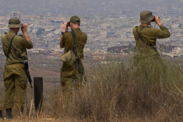 Israeli gunfire kills at least 25 in Gaza as Netanyahu says he will allow Palestinians to leave