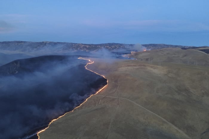 California firefighters make significant progress against wildfire east of San Francisco Bay