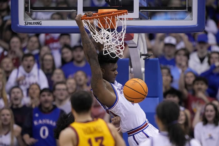 Adams scores late, No. 2 Kansas edges No. 14 Iowa St 62-60