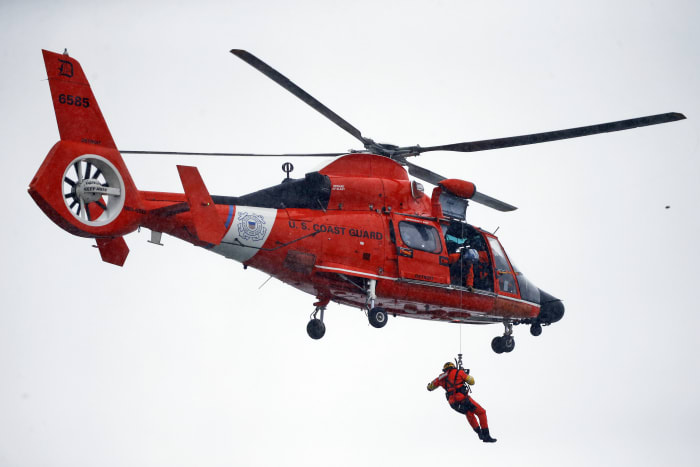 Coast Guard rescues 3 people from the Detroit River following a boat fire