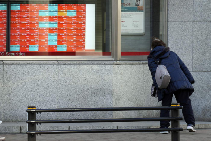 Stock market today: Asian shares trade mixed after Wall Street dips amid dimming rate cut hopes