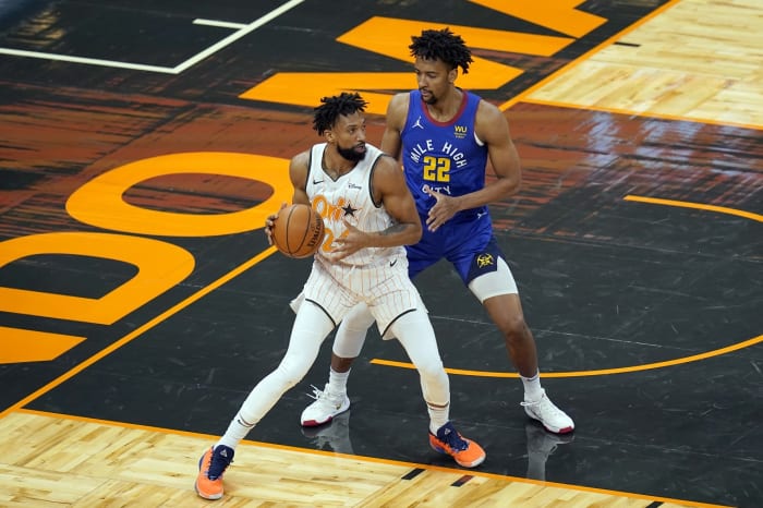 Sacramento Kings guard De'Aaron Fox (5) dribbles the ball during the second  half of an NBA basketball game against the Washington Wizards, Wednesday,  March 17, 2021, in Washington. The Kings won 121-119. (