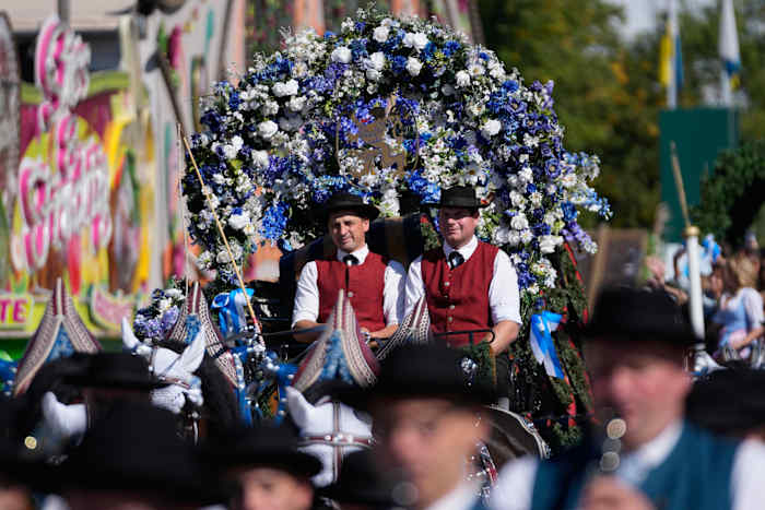 Munich’s Oktoberfest roars to life as the mayor taps the first keg