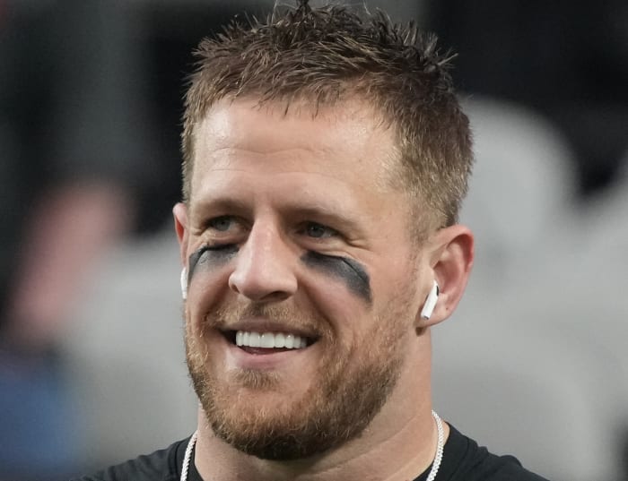 JJ Watt with Baby Son at Houston Texans Ring of Honor Induction