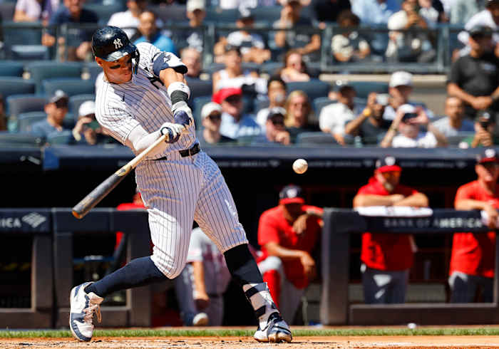 Yankees hit 4 home runs in a 9 run inning to rout Nationals 11 2