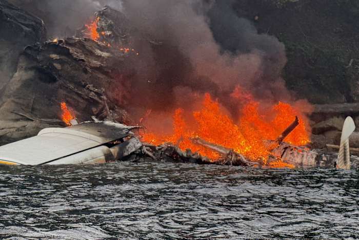 Image linked from the original feed: A seaplane crashes into a remote island north of Seattle. But all 11 on board are rescued